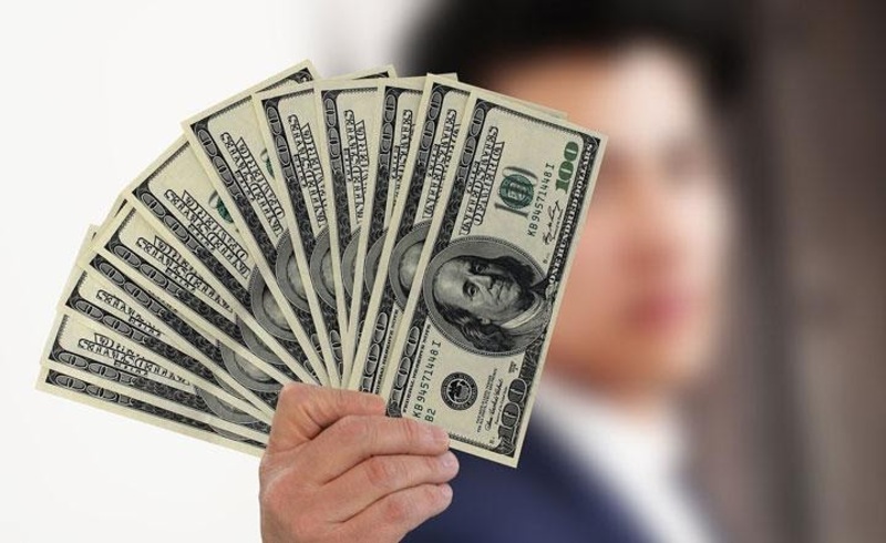 Chiêm bao được chồng cho tiền đô la là dấu hiệu thăng tiến trong công việc